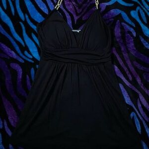 Black mini dress with gold chain straps